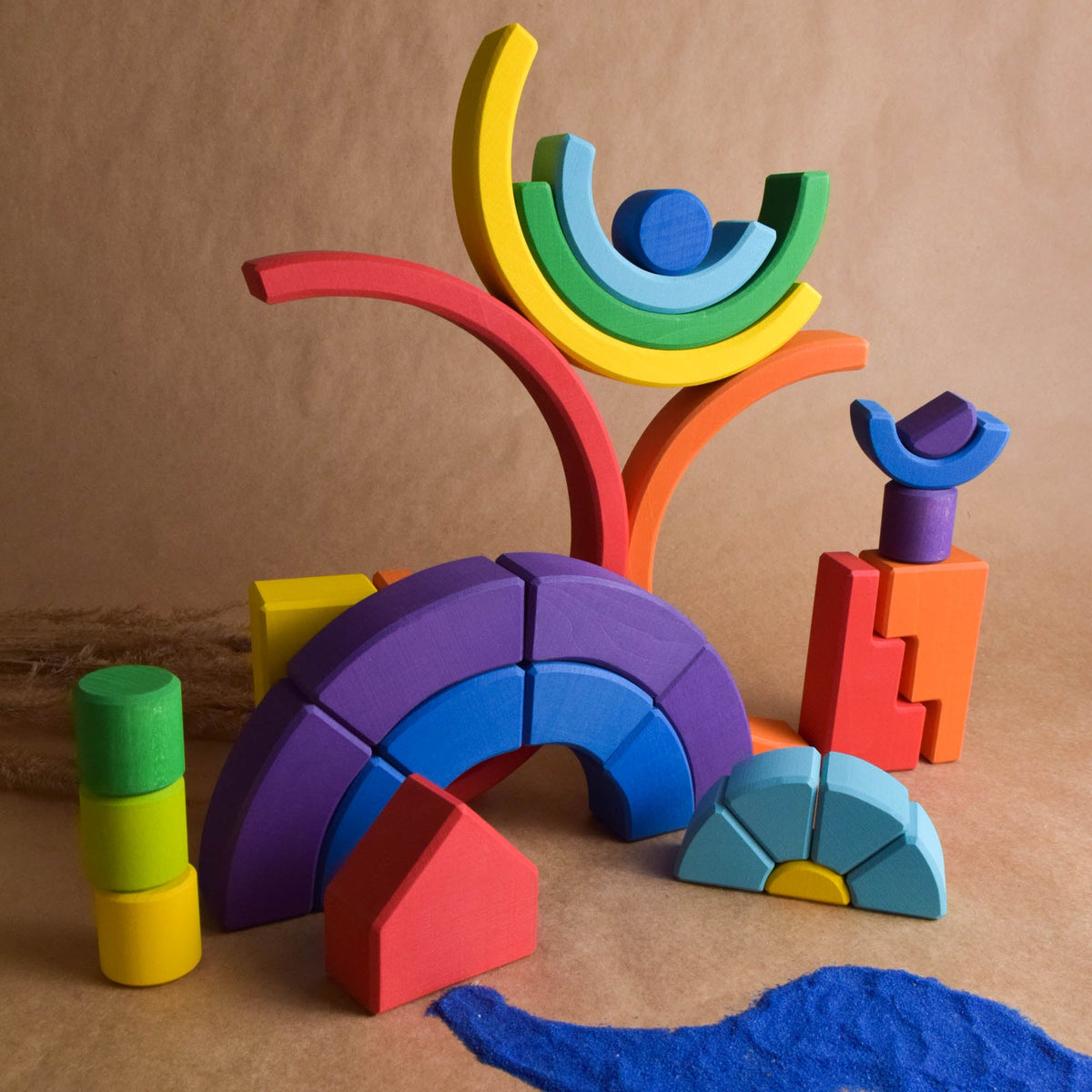 Rainbow Romanesque Building Set wooden toy shown for open-ended building and imaginative play.