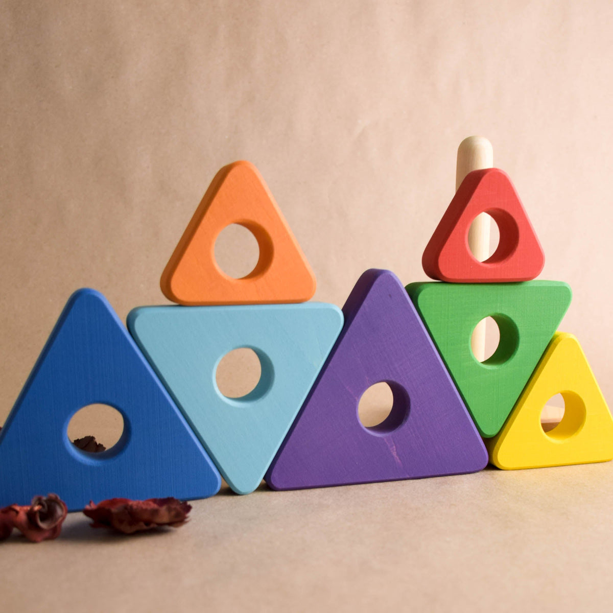 Wooden stacking rings toy with triangular rings