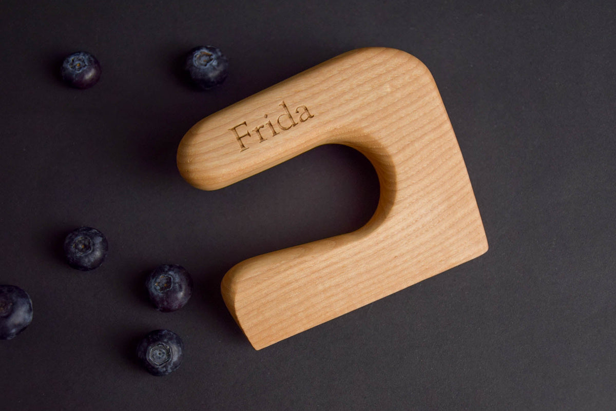 Handmade Montessori cutting knife in solid ash wood with a natural oil finish