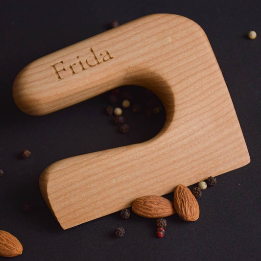 Handmade Montessori cutting knife in solid ash wood with a natural oil finish