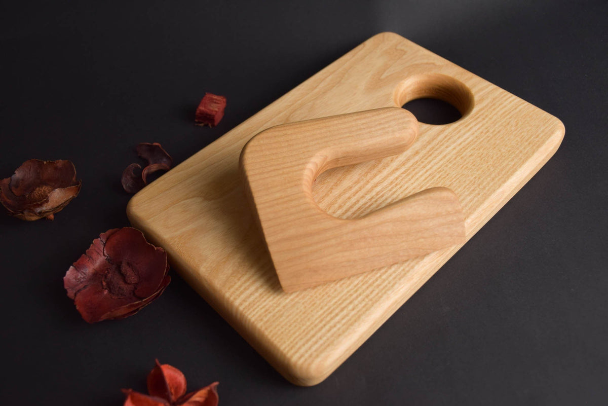 Handmade Montessori cutting knife in solid ash wood with a natural oil finish