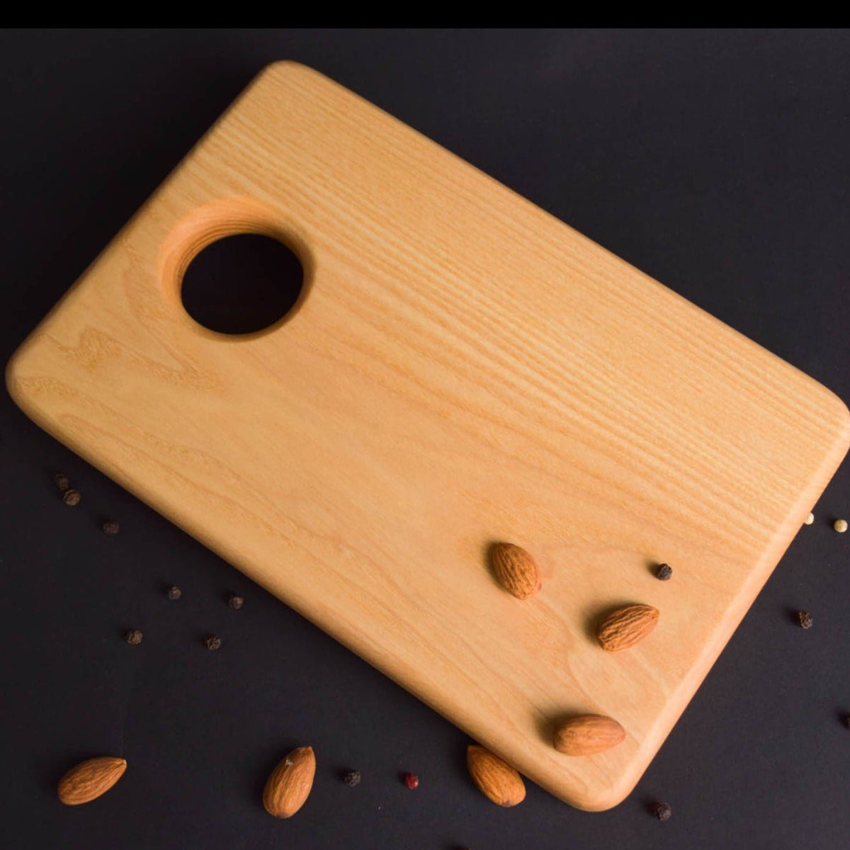 Handmade Montessori knife and cutting board set in solid ash wood with a natural oil finish