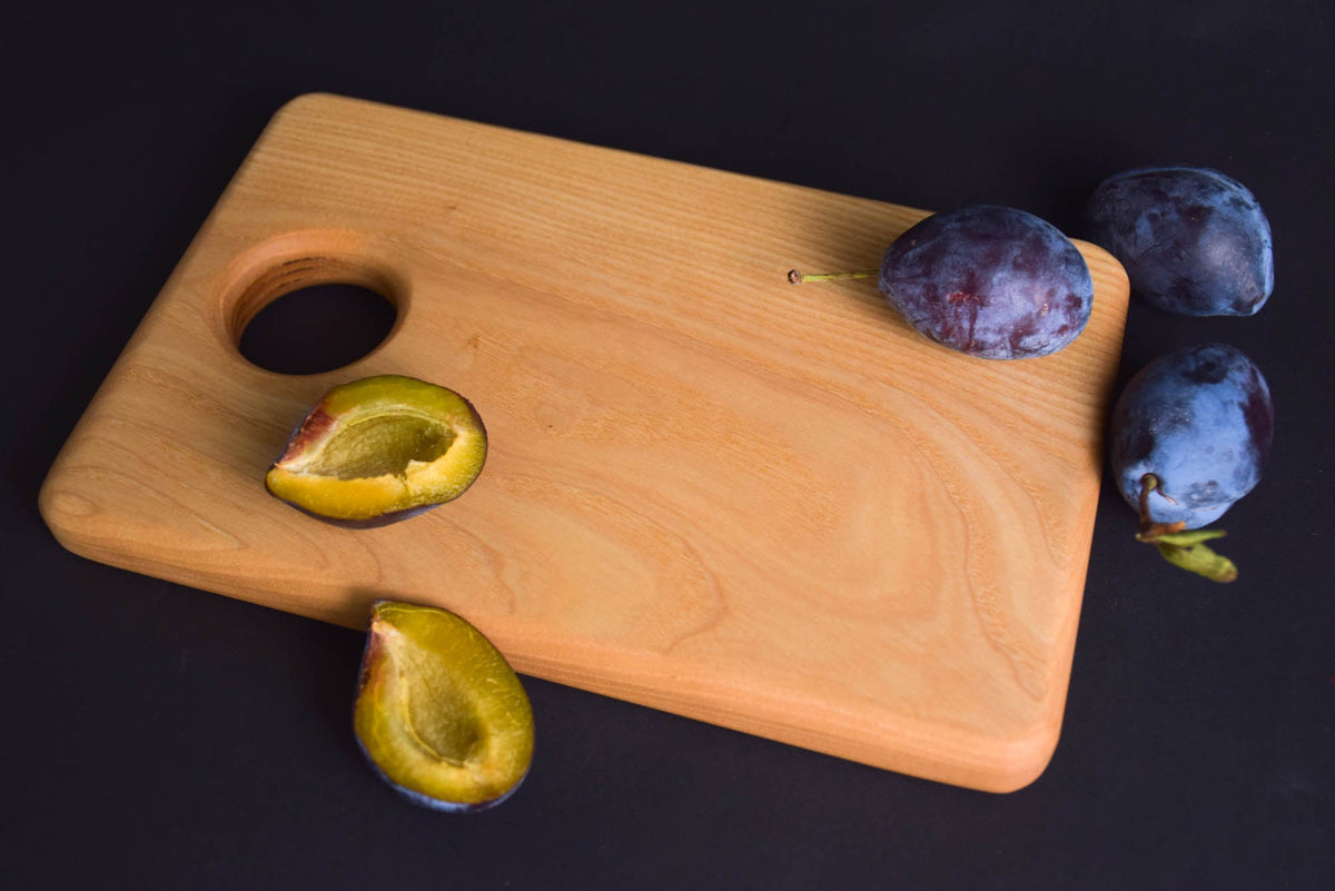 Handmade Montessori knife and cutting board set in solid ash wood with a natural oil finish