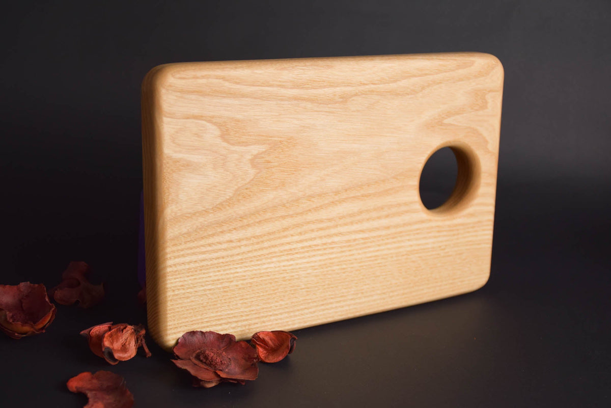 Handmade Montessori knife and cutting board set in solid ash wood with a natural oil finish