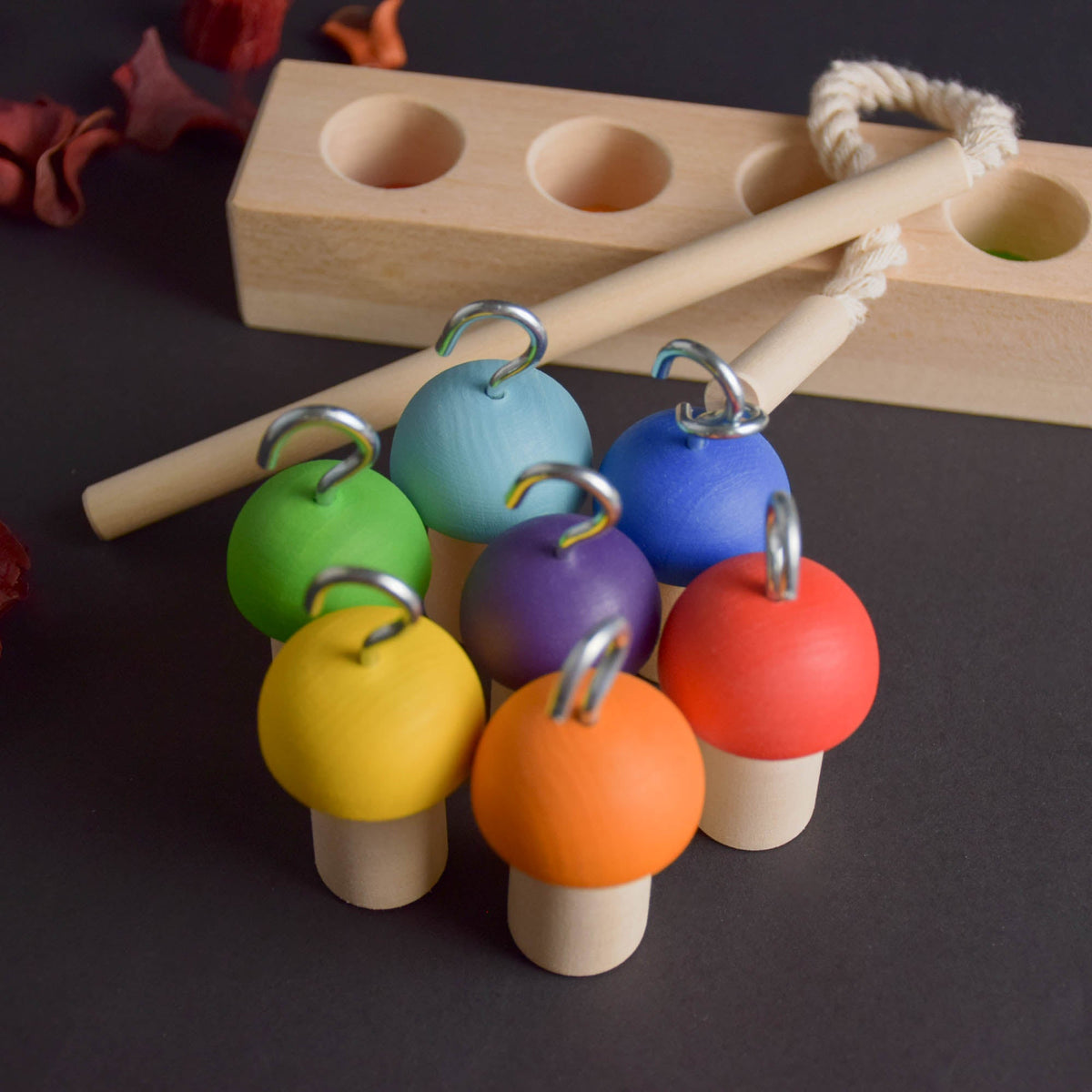 Balancing game featuring mushrooms and a fishing rod