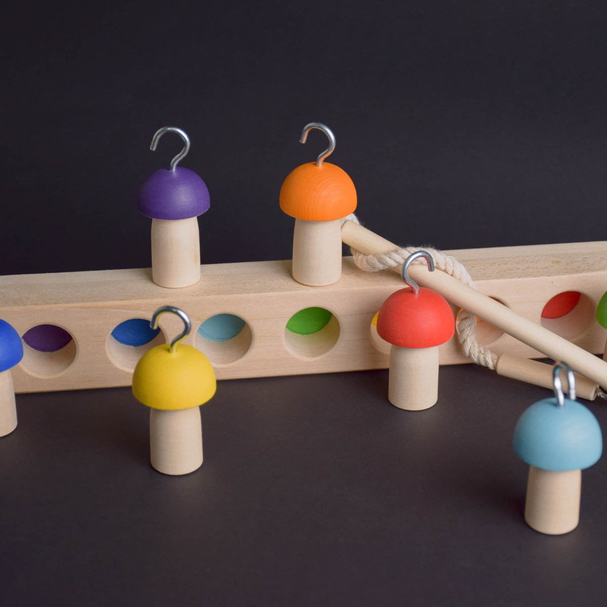 Fishing and balancing game with mushroom pieces
