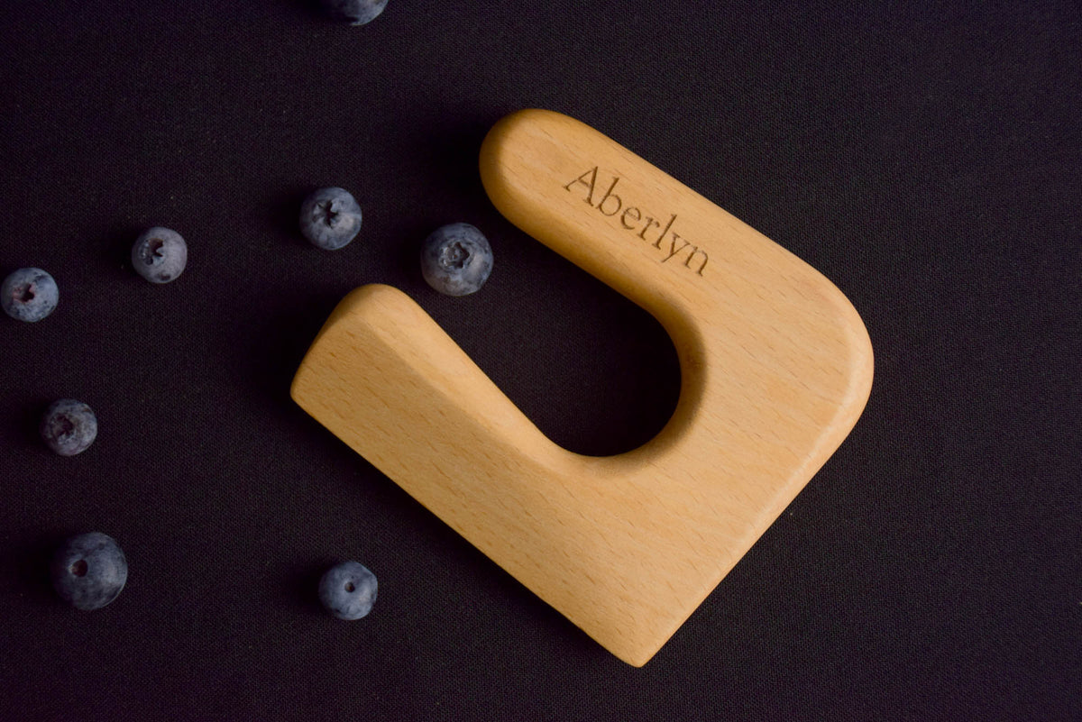 Handmade Montessori knife and cutting board set in solid beech wood with a natural oil finish