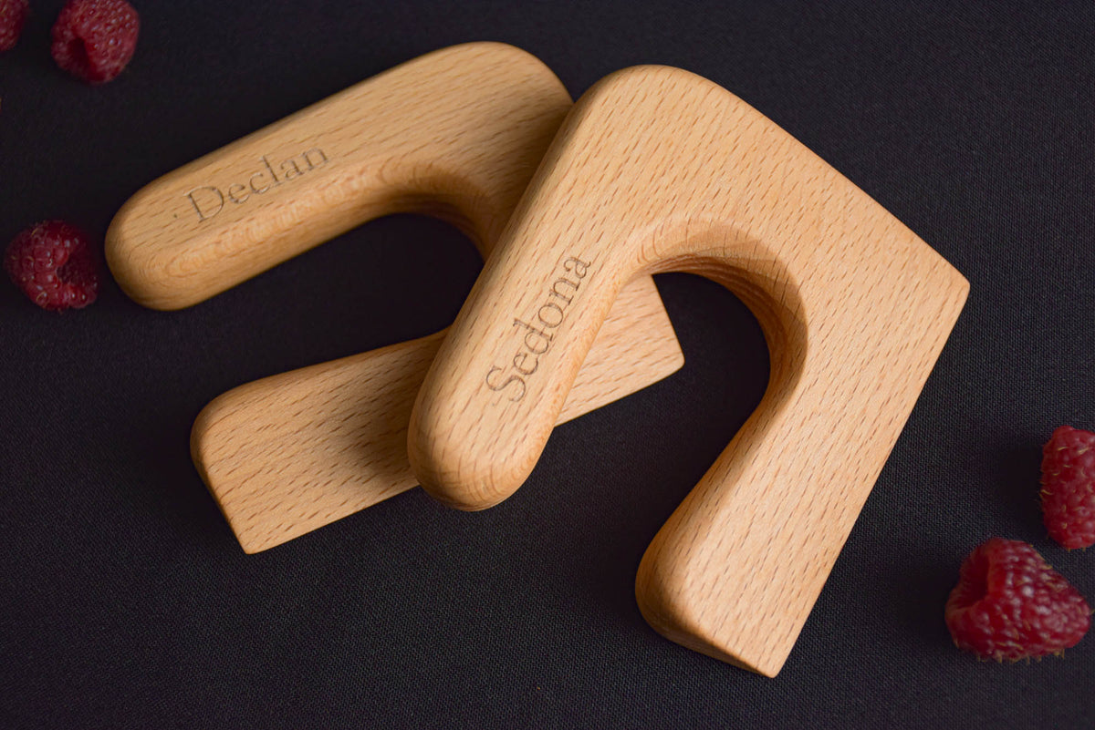 Handmade Montessori knife and cutting board set in solid beech wood with a natural oil finish