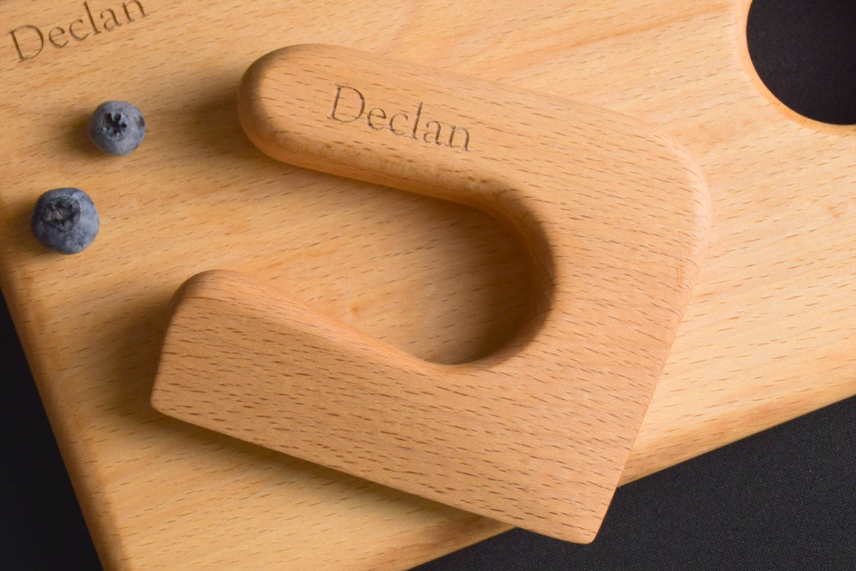 Handmade Montessori knife and cutting board set in solid beech wood with a natural oil finish