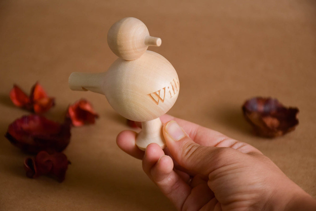 Wooden bird whistle toy made from linden wood
