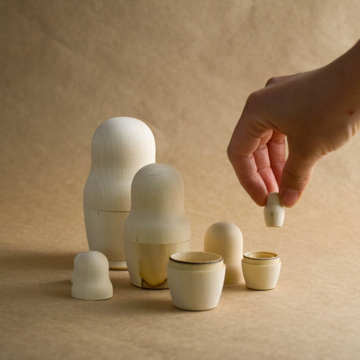 Linden wood nesting figures with undecorated surfaces