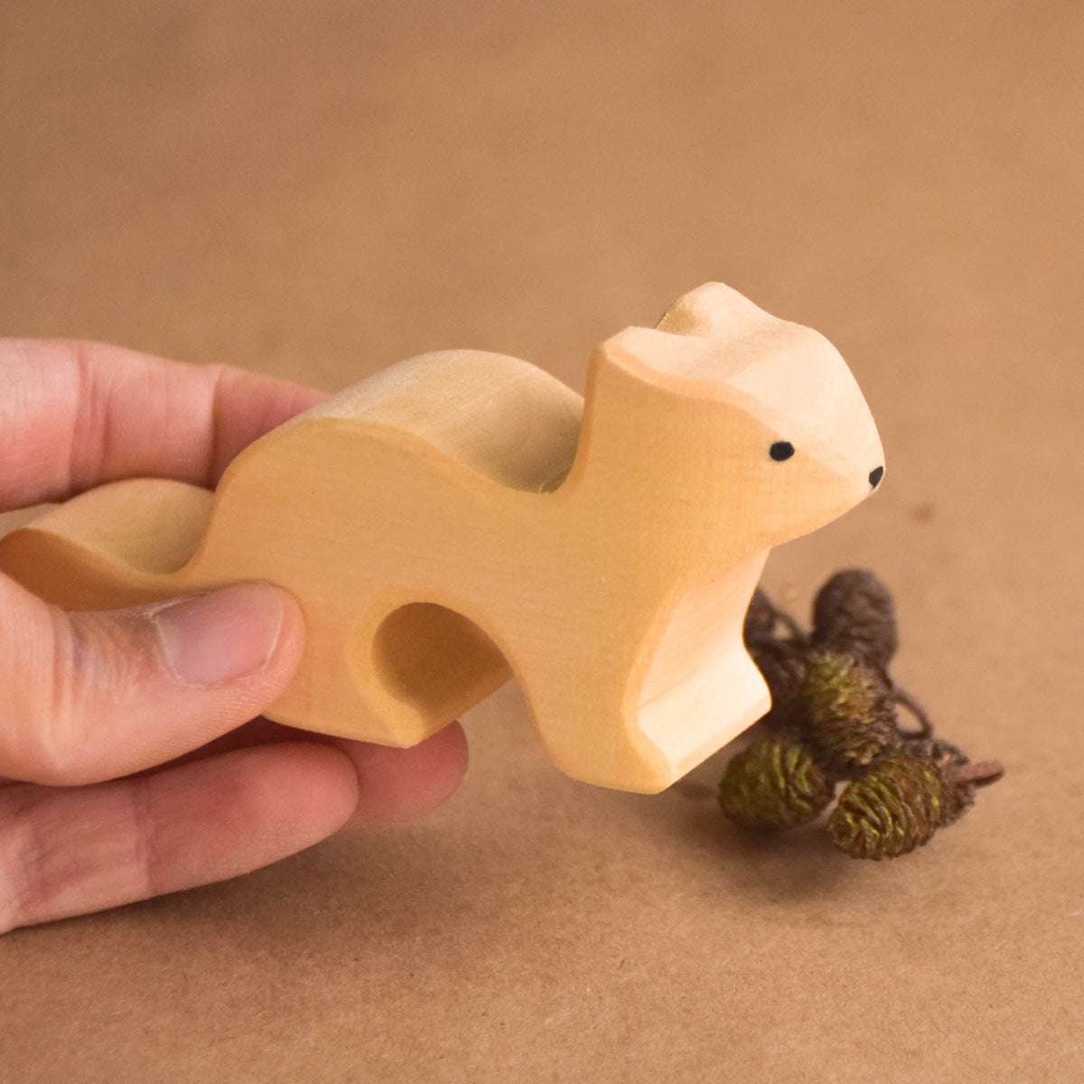 Seven hand-painted wooden woodland animals