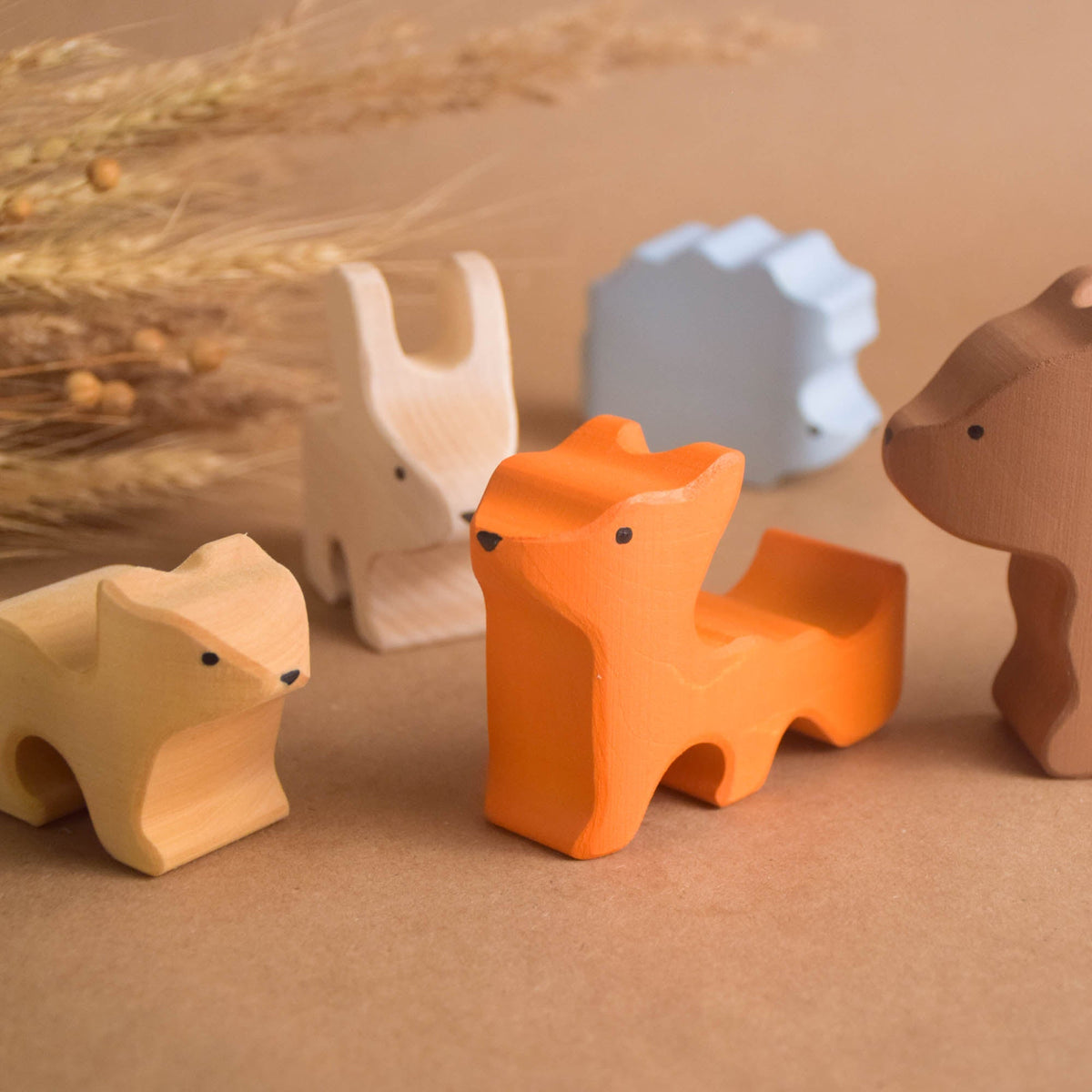 Seven hand-painted wooden woodland animals