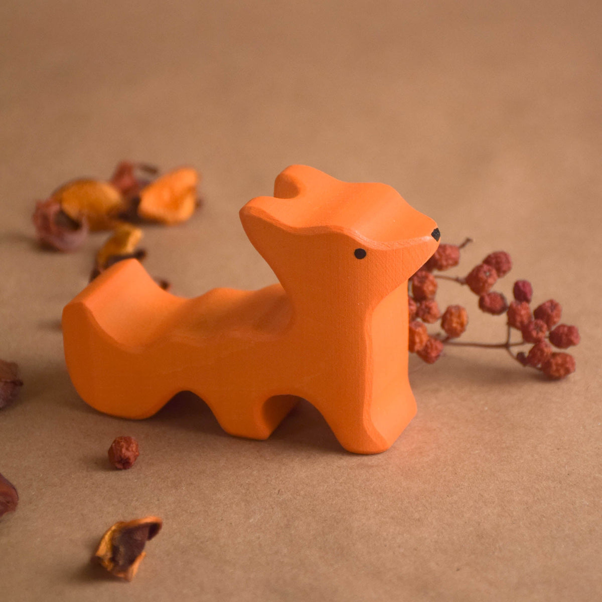 Painted wooden animals for a miniature forest