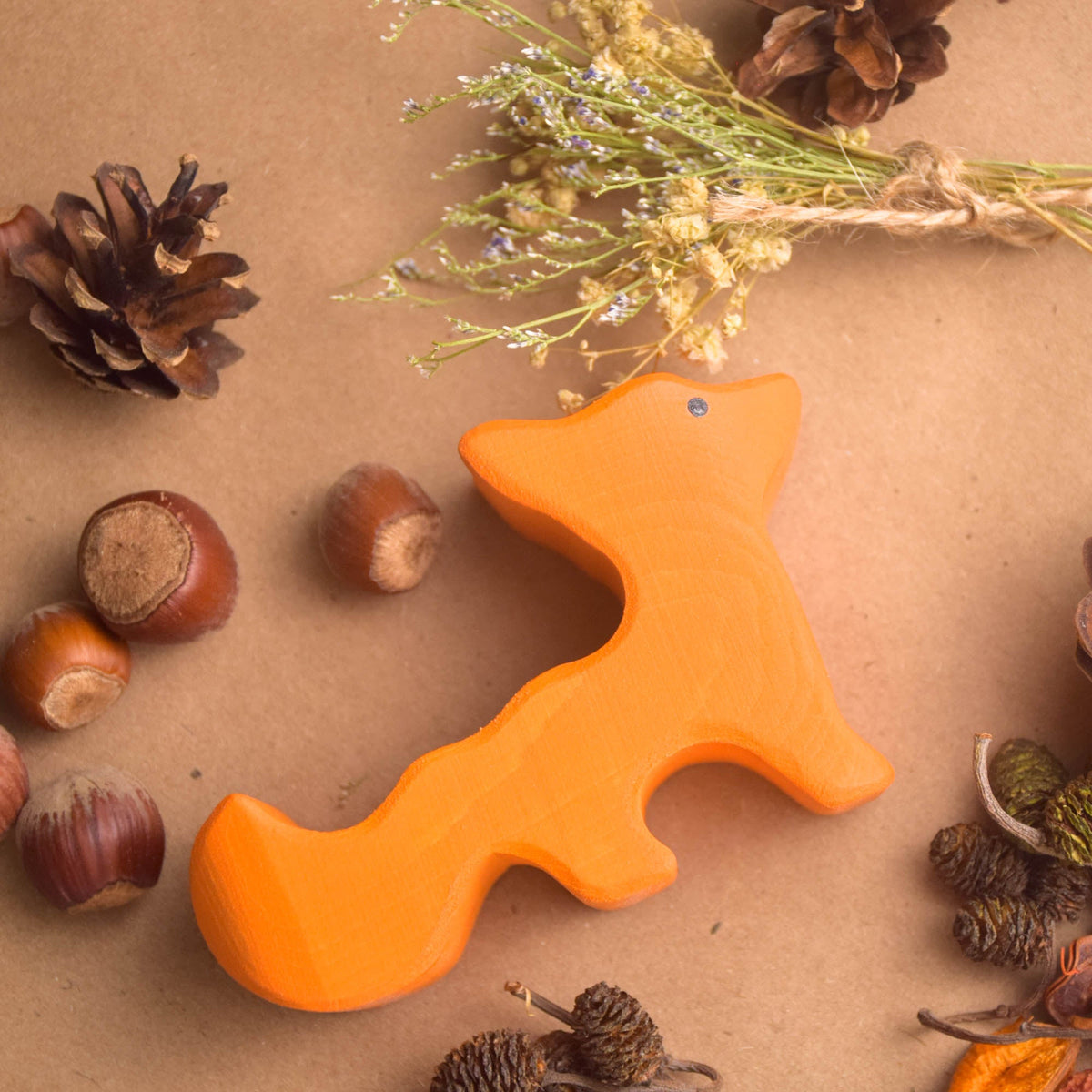 Colored wooden animal figures for imaginative play