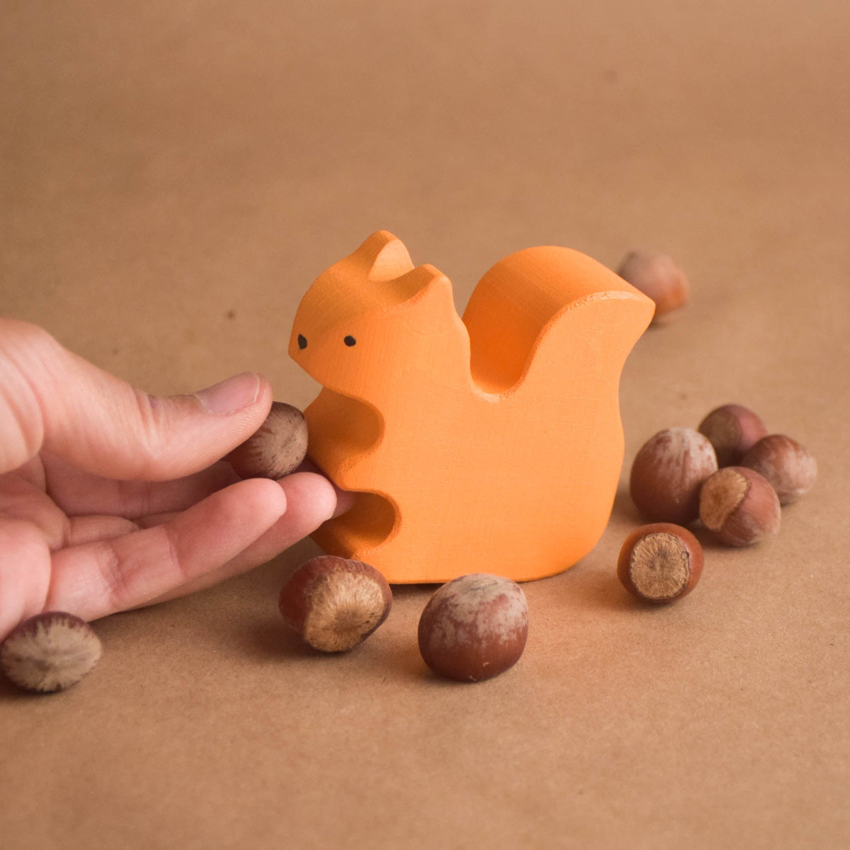Colored wooden animal figures for imaginative play