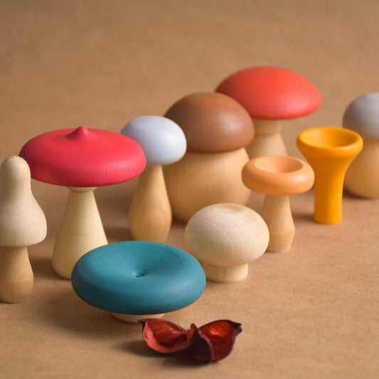 Colored wooden mushroom figurines set