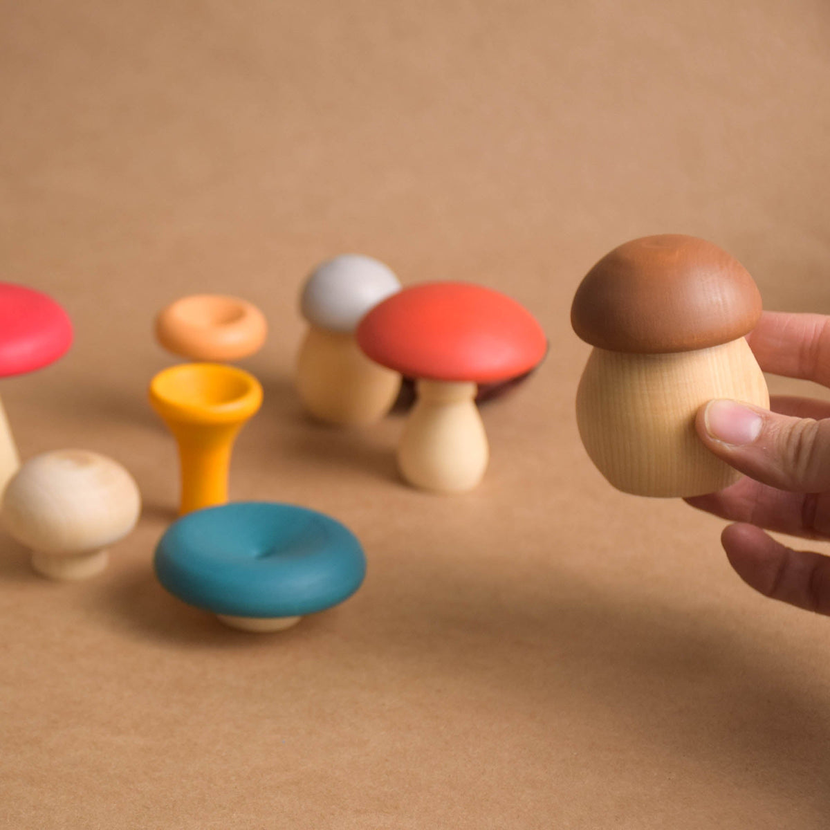 Colored wooden mushroom figurines set