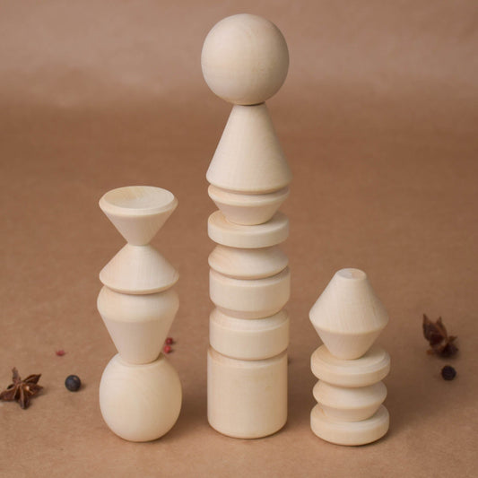 Wooden balance stacking toy with pieces in different shapes.