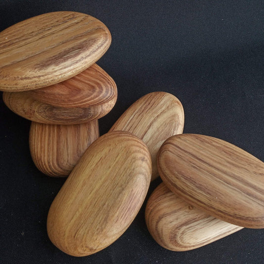 Handcrafted green acacia wooden stacking pebbles