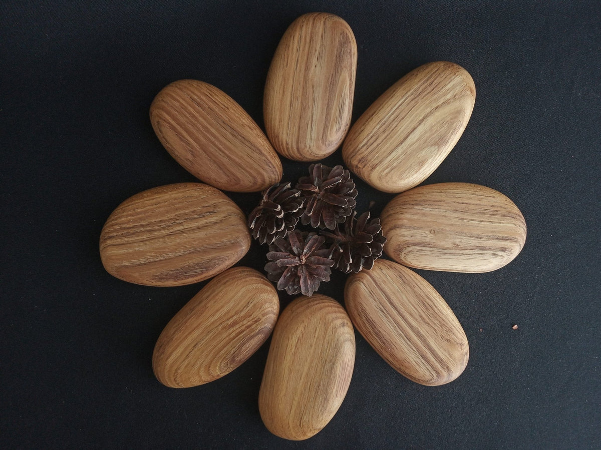 Wooden pebbles handcrafted from green acacia
