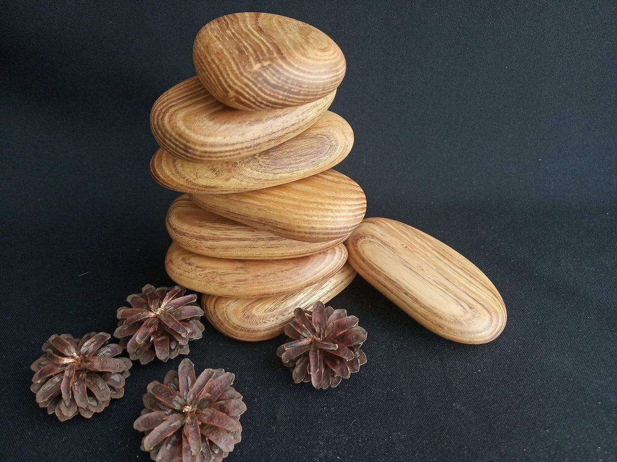 Green acacia wood pebble-shaped stacking blocks