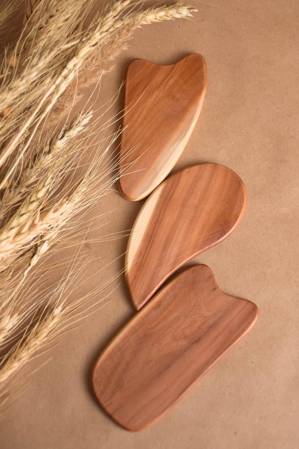 Handcrafted wooden gua sha tool for facial massage