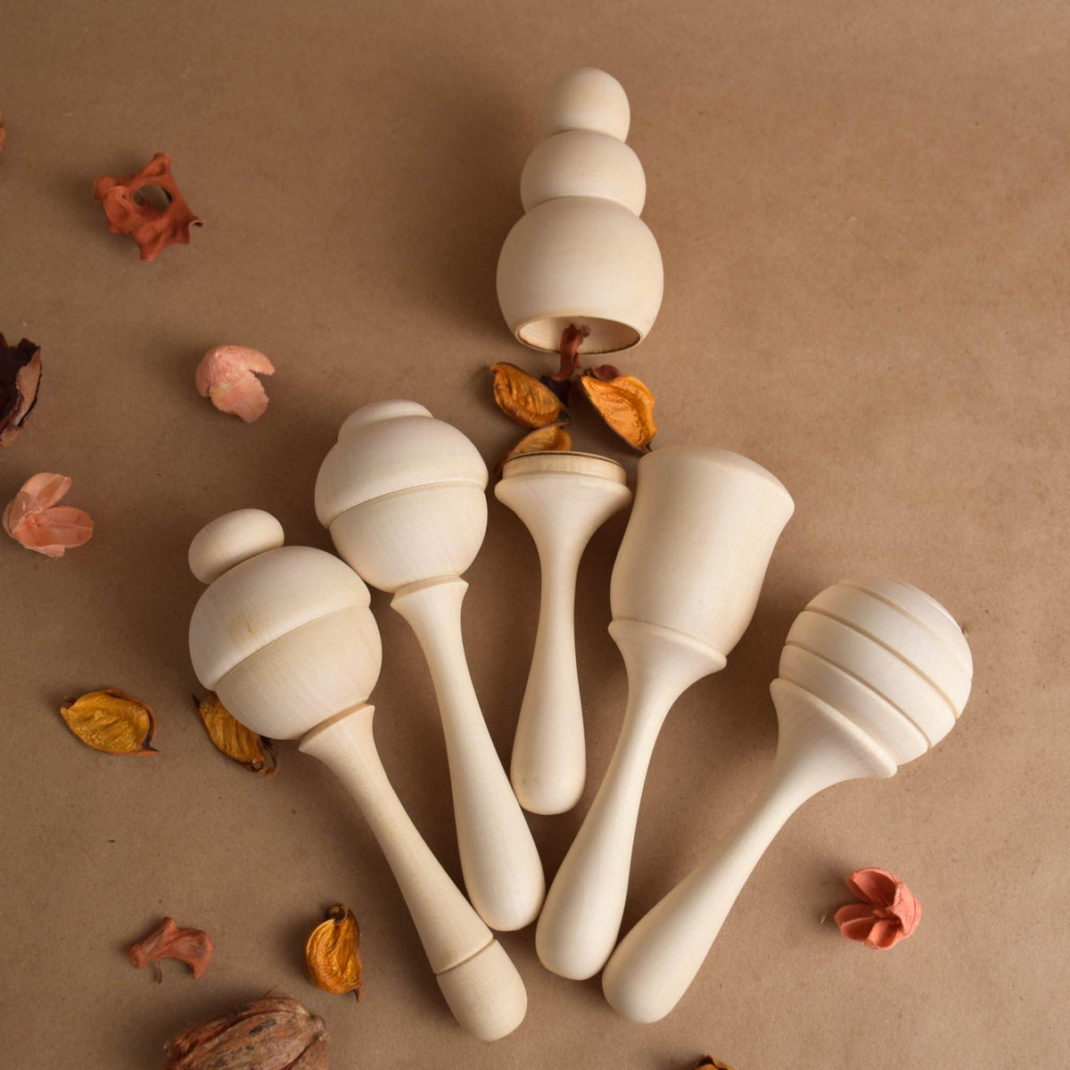Wooden baby maraca from the Honey collection