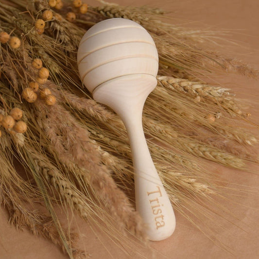 Honey wooden maraca baby rattle made from linden wood