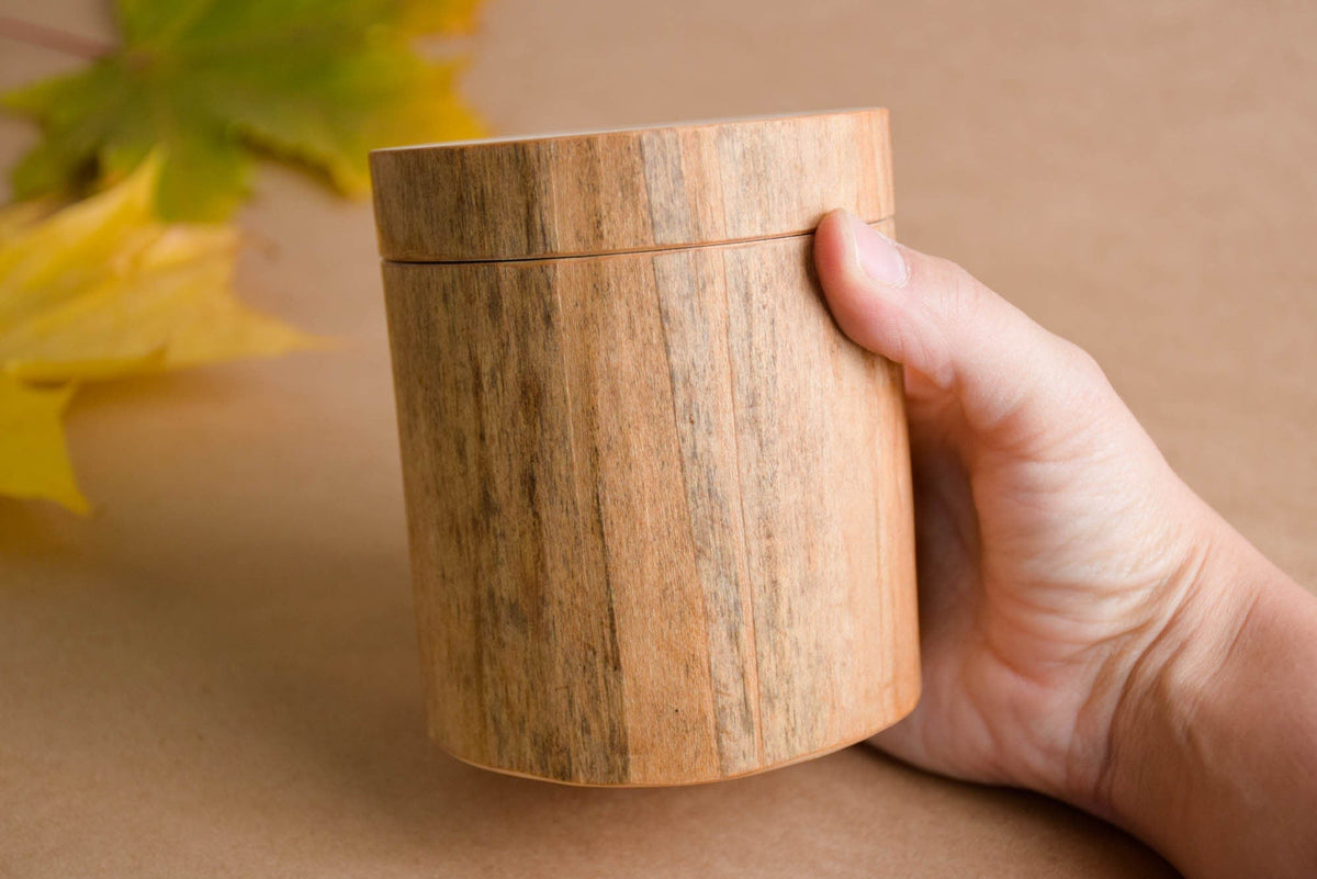Log-style wooden storage box made from linden