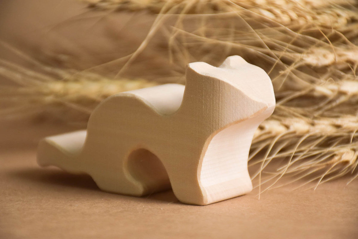 Seven natural wooden forest animal figures