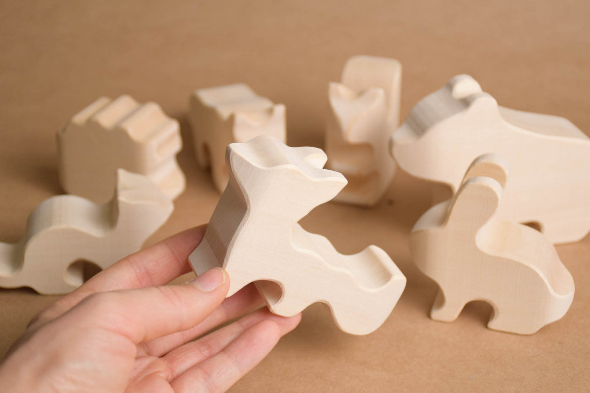 Wooden wolf, hedgehog, hare, marten, squirrel, fox, and bear