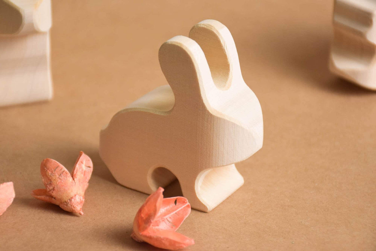 Natural wood animal figures for imaginative play