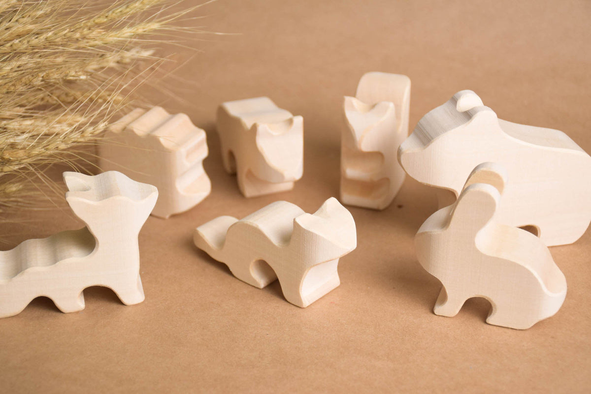 Wooden wolf, hedgehog, hare, marten, squirrel, fox, and bear