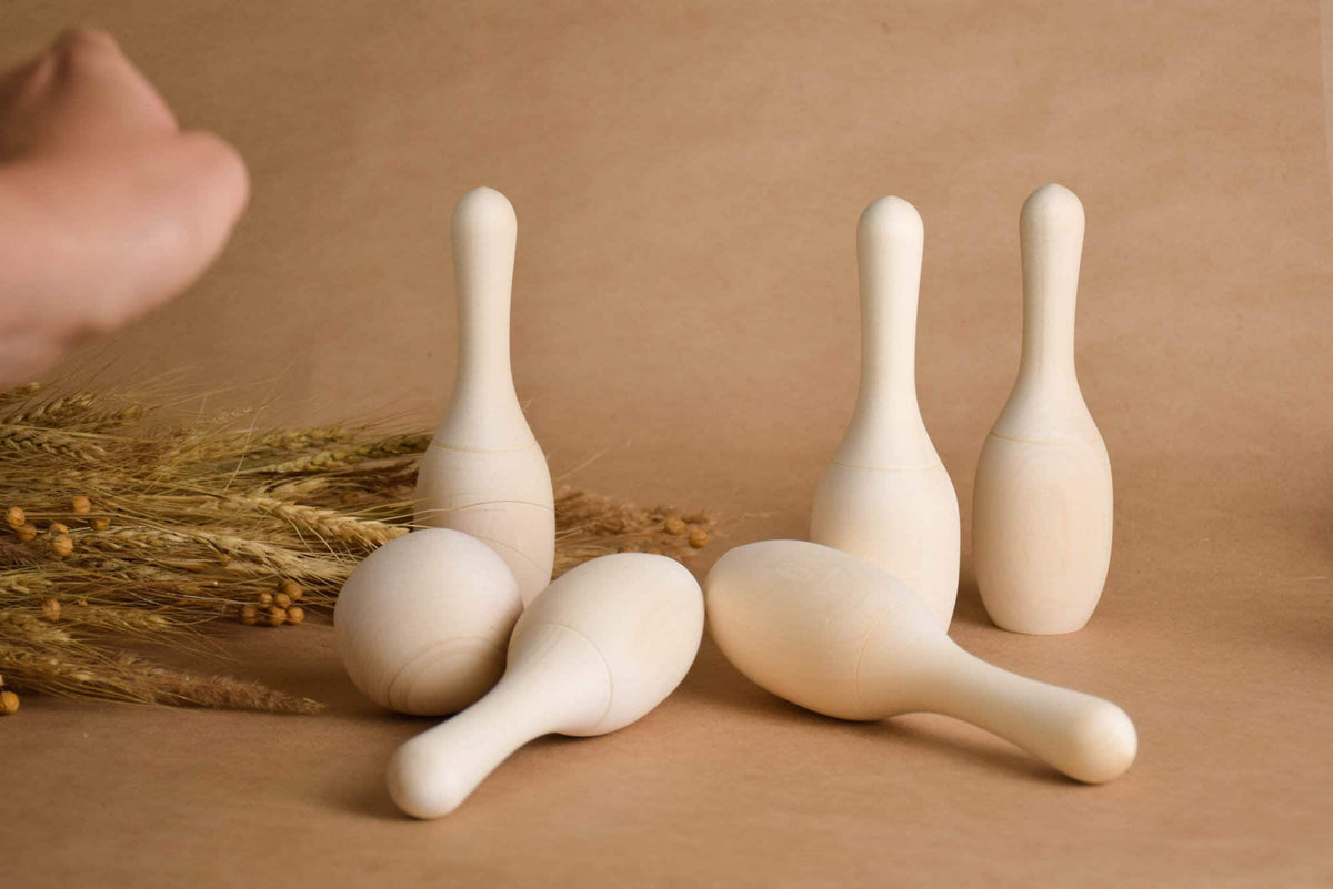 Mini bowling game with wooden pins