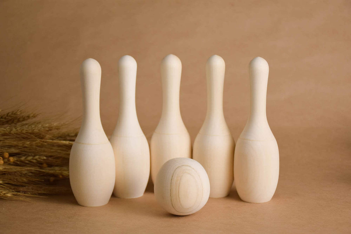 Mini bowling game with wooden pins