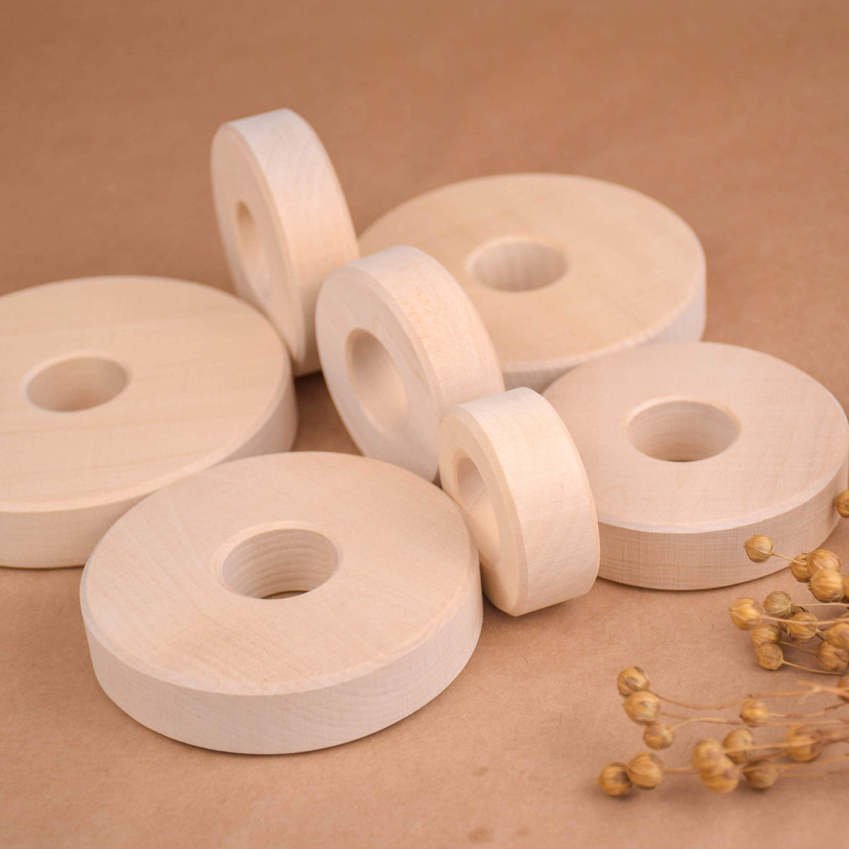 Stacking toy with rings made from linden wood