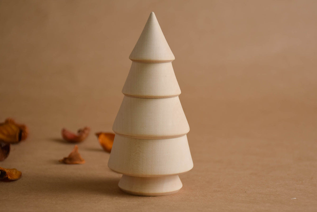 Handmade wooden trees for nature-inspired play