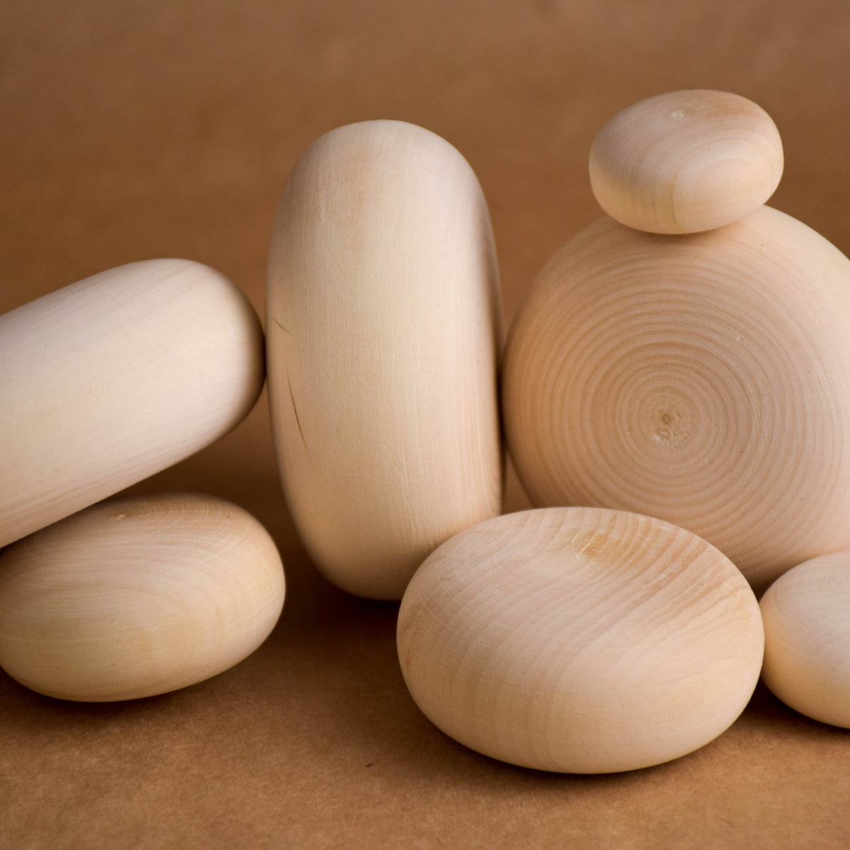 Wooden pebbles for balancing and stacking