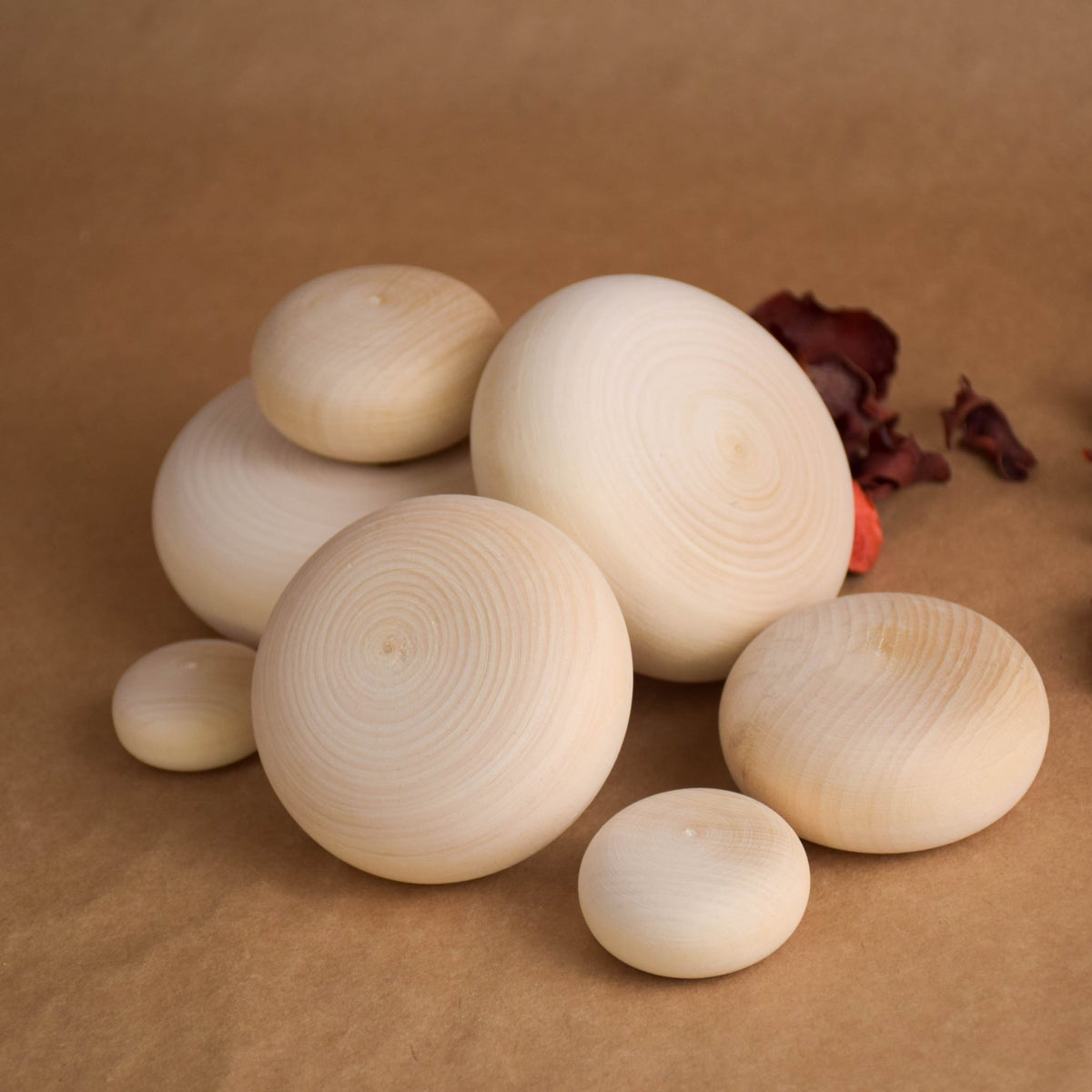 Stacking stones in wooden river pebble shapes