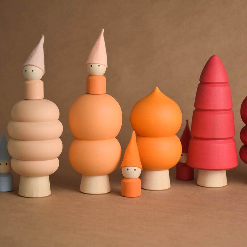 Wooden trees and peg dolls for woodland play