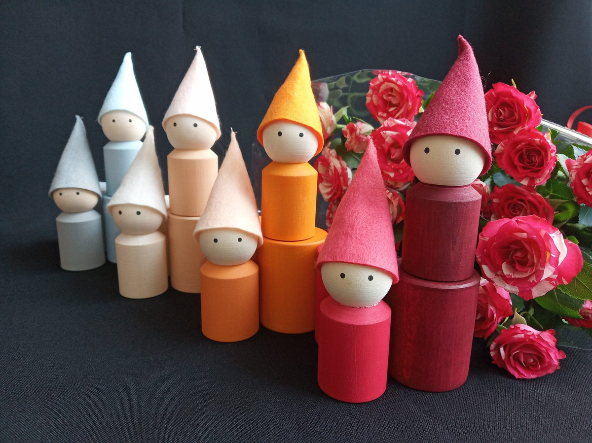 Linden wood peg dolls and cups in neutral colors