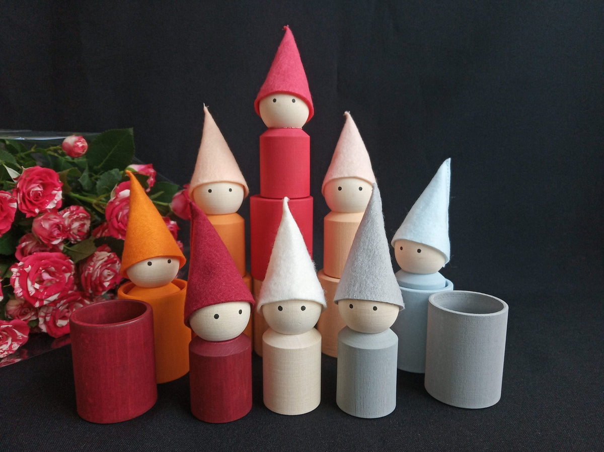 Linden wood peg dolls and cups in neutral colors