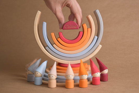 Handmade Montessori neutral rainbow building toy in wood and plywood with a natural wax-and-oil finish