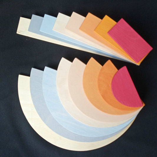 Handmade Montessori neutral semicircle building toy in plywood with a natural wax-and-oil finish