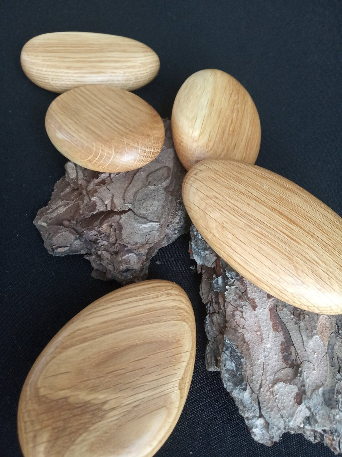 Wooden stacking pebbles made from pedunculate oak