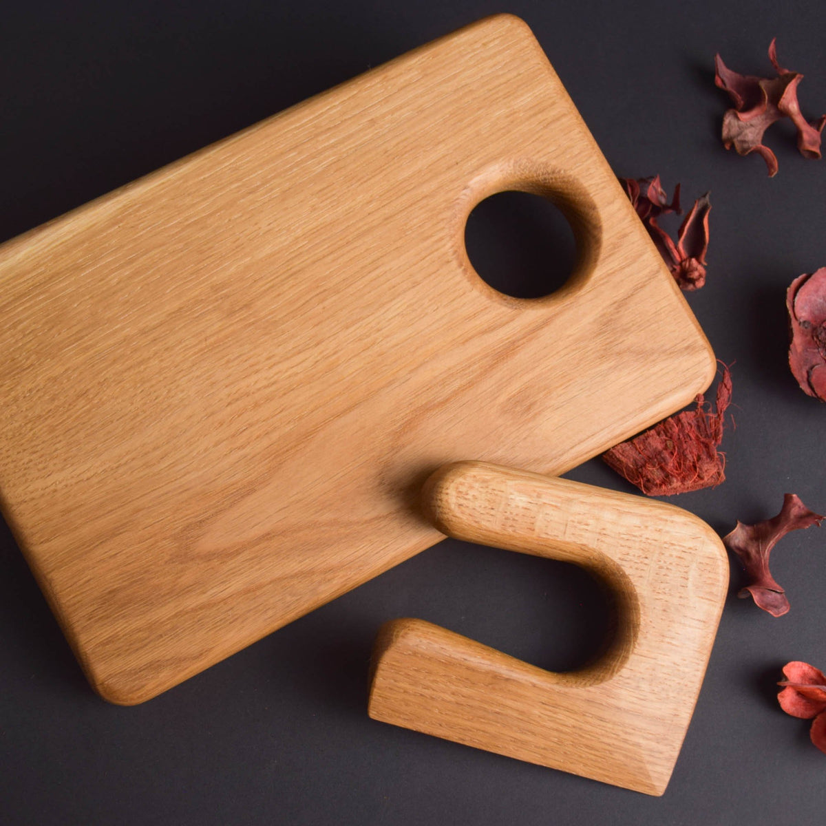 Handmade Montessori knife and cutting board set in solid oak wood with a natural oil finish