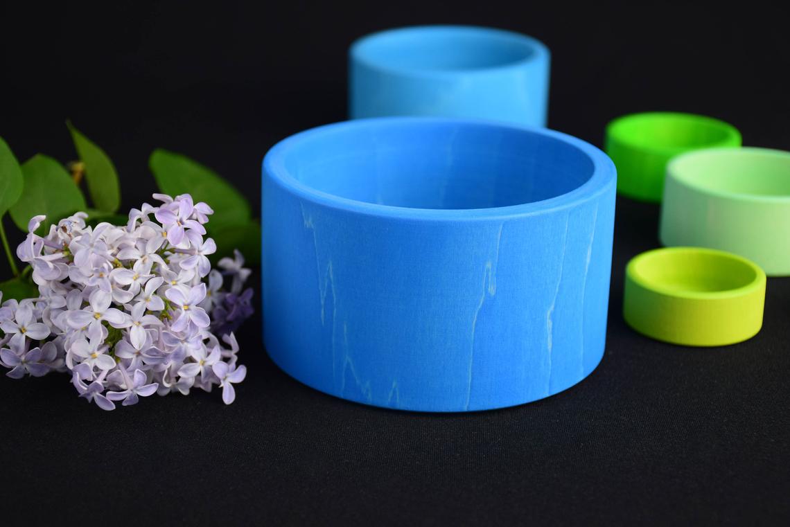 Wooden nesting bowls in ocean blue shades
