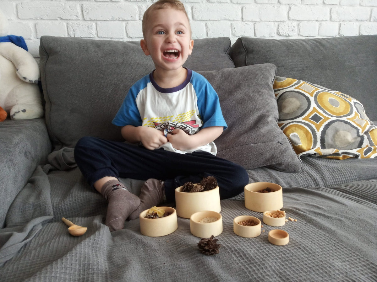 Wooden stacking bowls in ocean blue