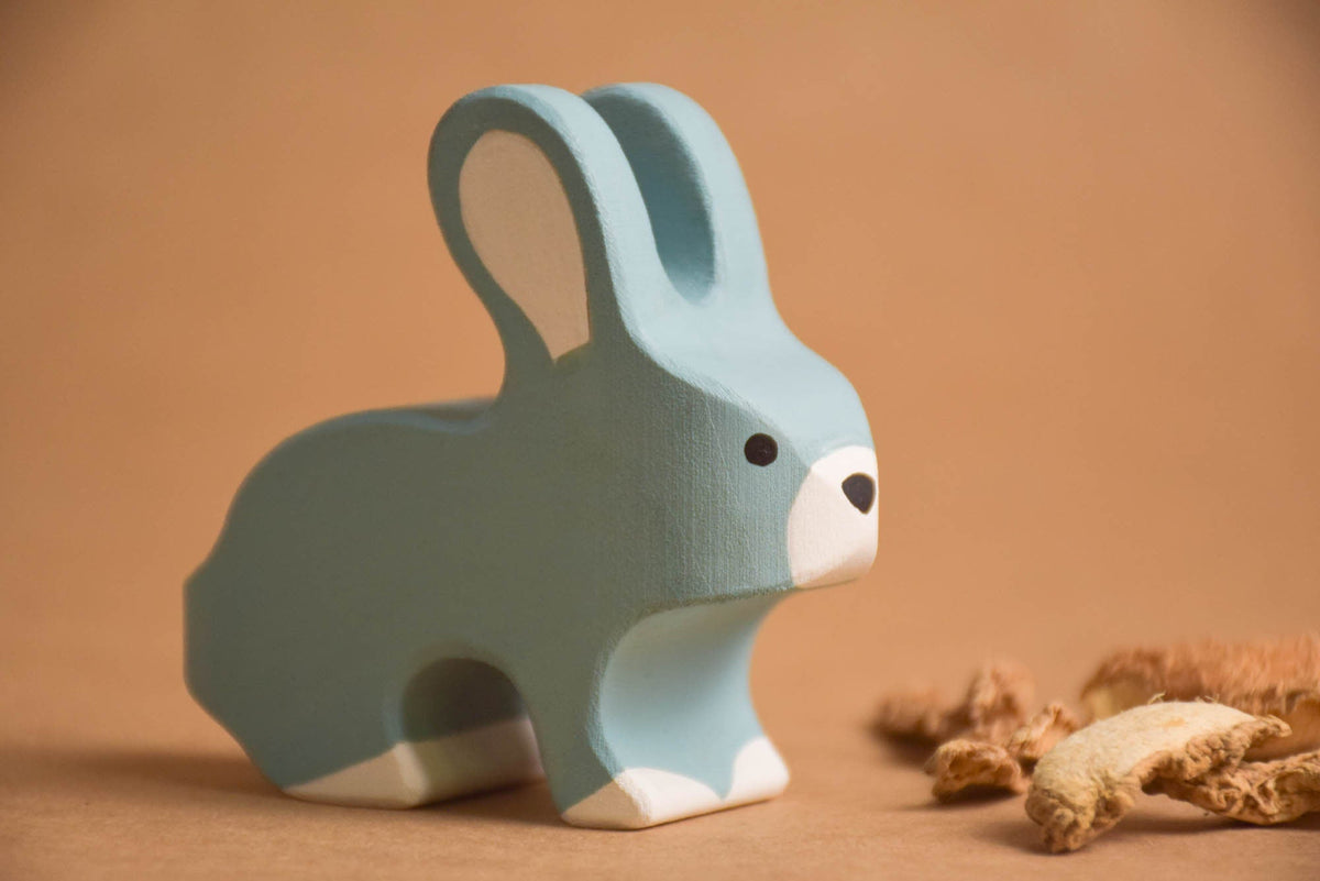 Seven painted wooden forest animal figures